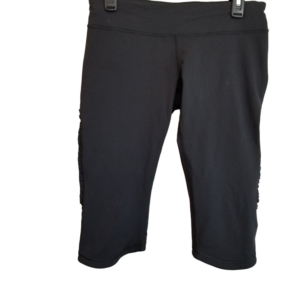 Lululemon Women's Run Fast Free Cropped Leggings Size 10 Black Pocket Ruffled